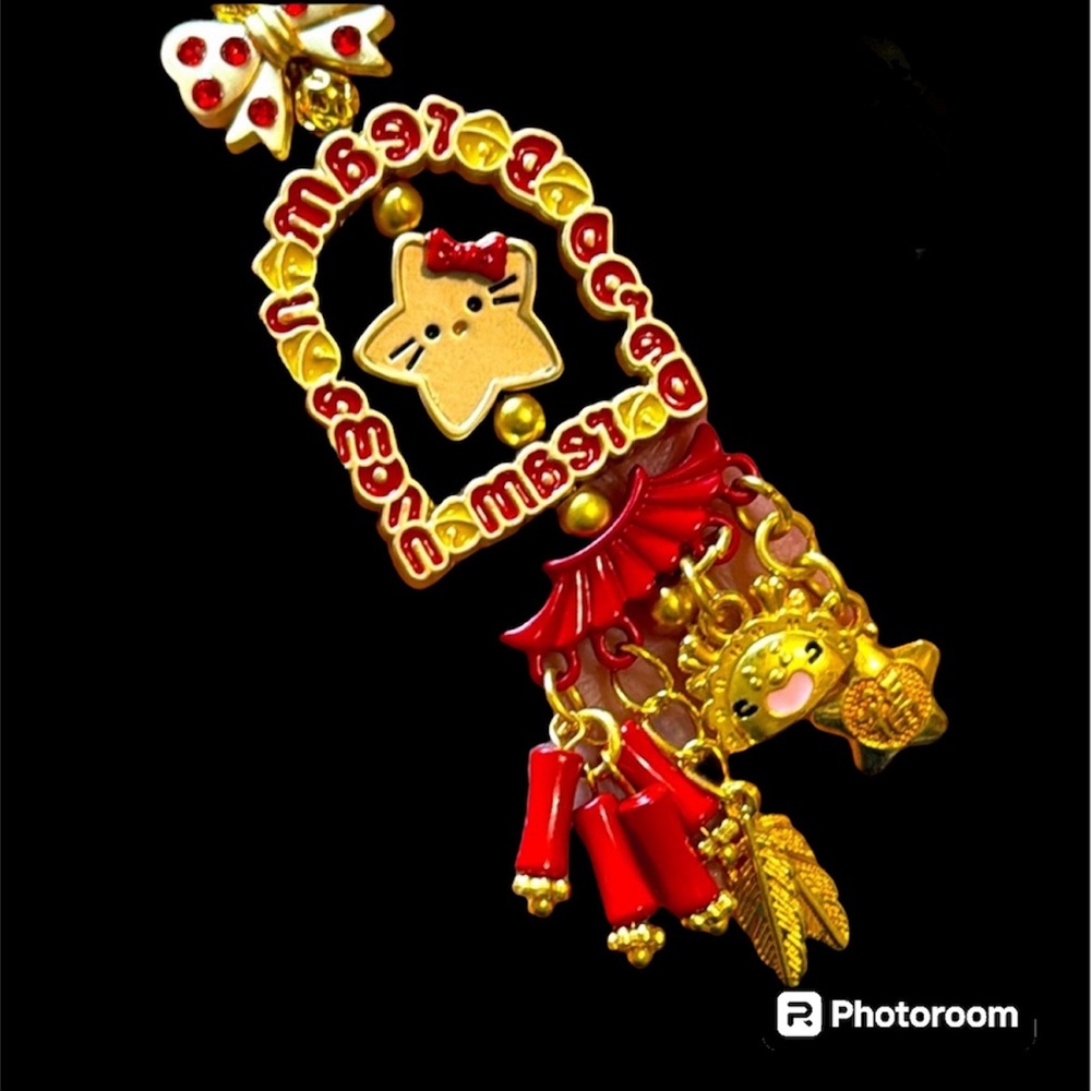 Hello kitty luck charm